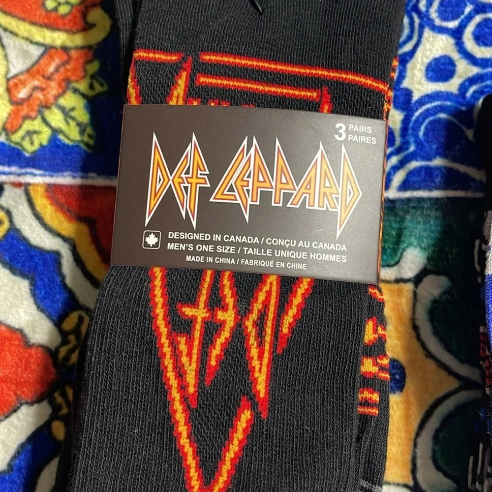 Two sets of socks - Def Leppard and Top Gun